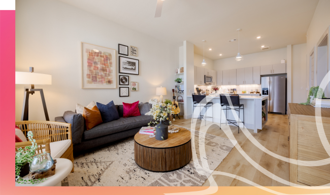 The essence of exceptional living Spacious living room with view into fully equipped eat in kitchen