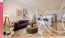 Spacious living room with view into fully equipped eat in kitchen
