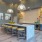 resident kitchen area with large island and bar stools
