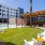 lawn area with seating next to a pool