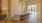 lobby area with a large desk and chairs