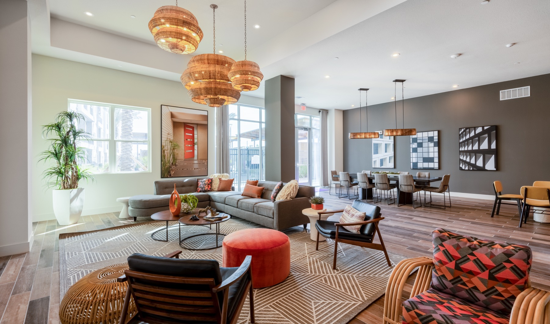 Resident lounge with soft seating, chef's kitchen and games.